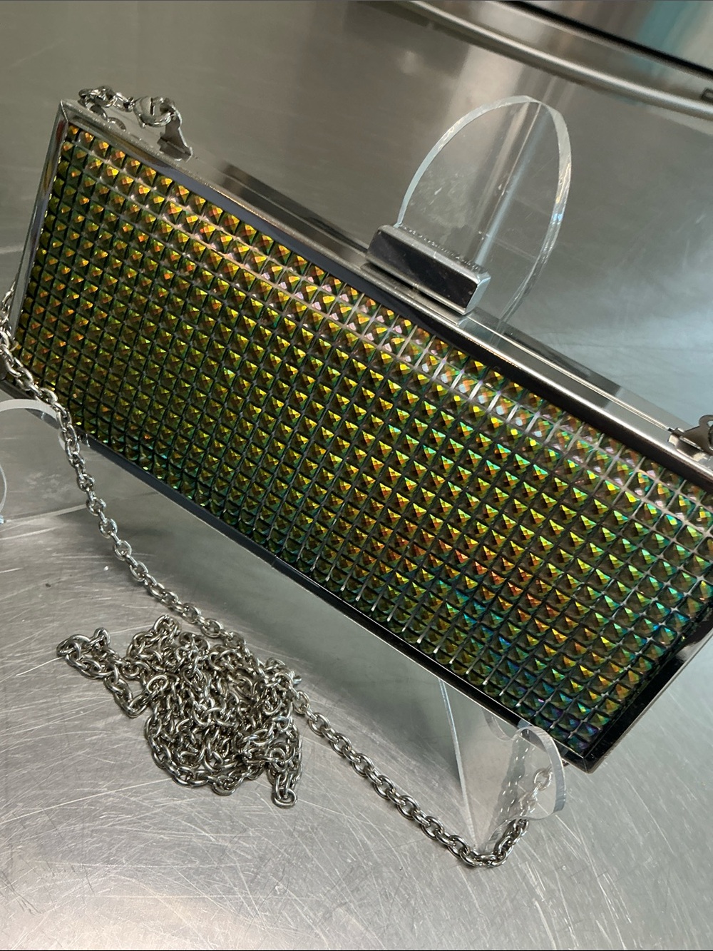 BCBGeneration Rainbow Iridescent Hard Shell clutch.